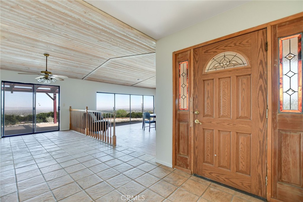 2929 Snow Line Drive Pinon Hills, CA 92372 - Photo 9 of 67 a view of a livingroom with furniture and window