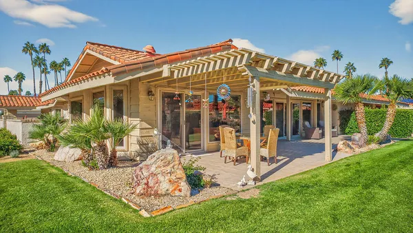 a view of a house with patio