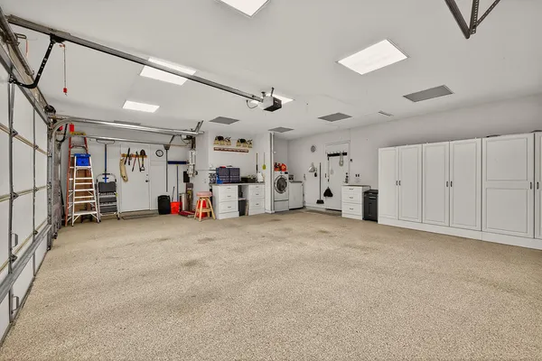 a view of garage with garage