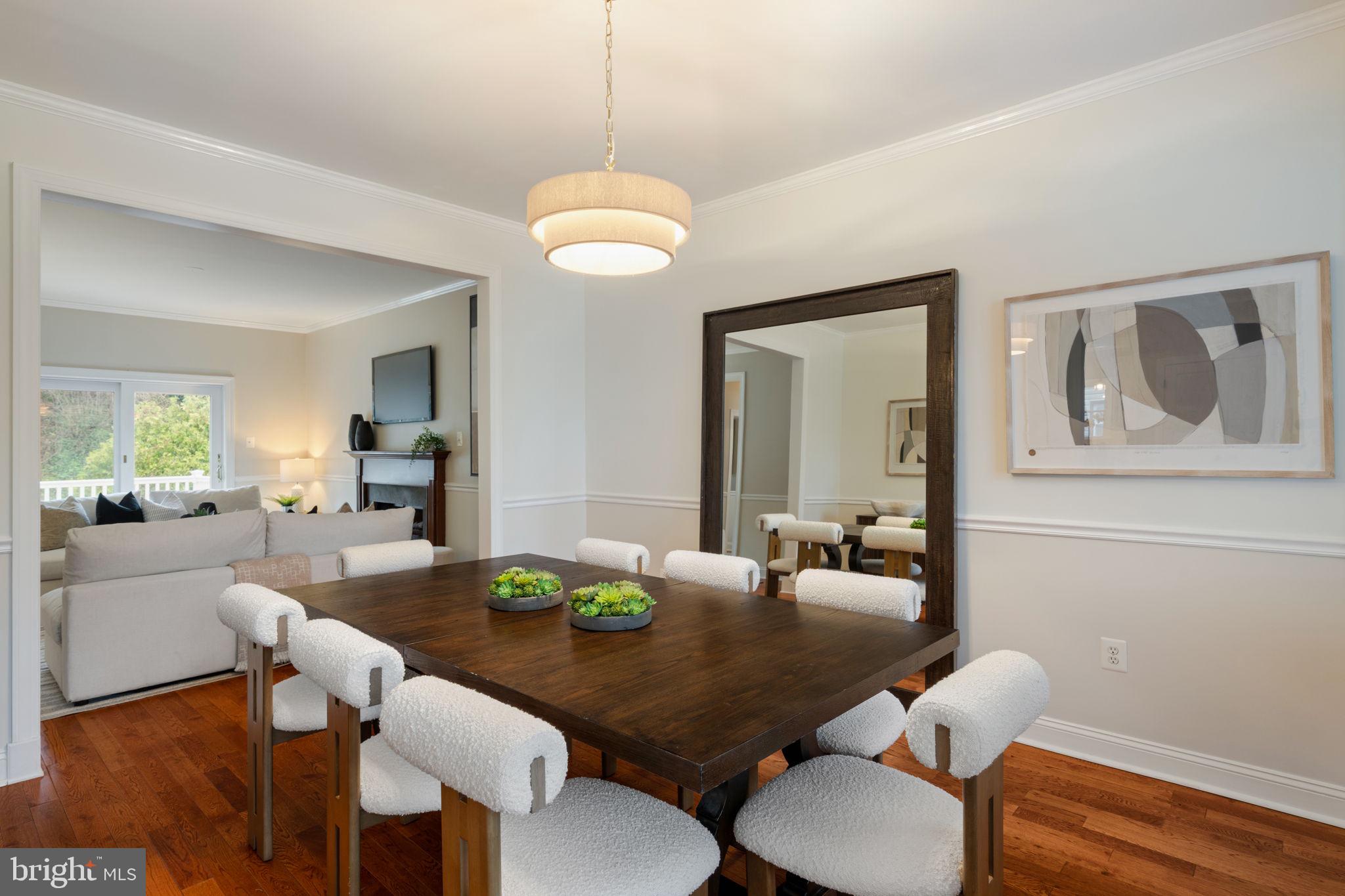 1723 Powder Mill Lane Wynnewood, PA 19096 - Photo 7 of 46 a view of a dining room with furniture and wooden floor