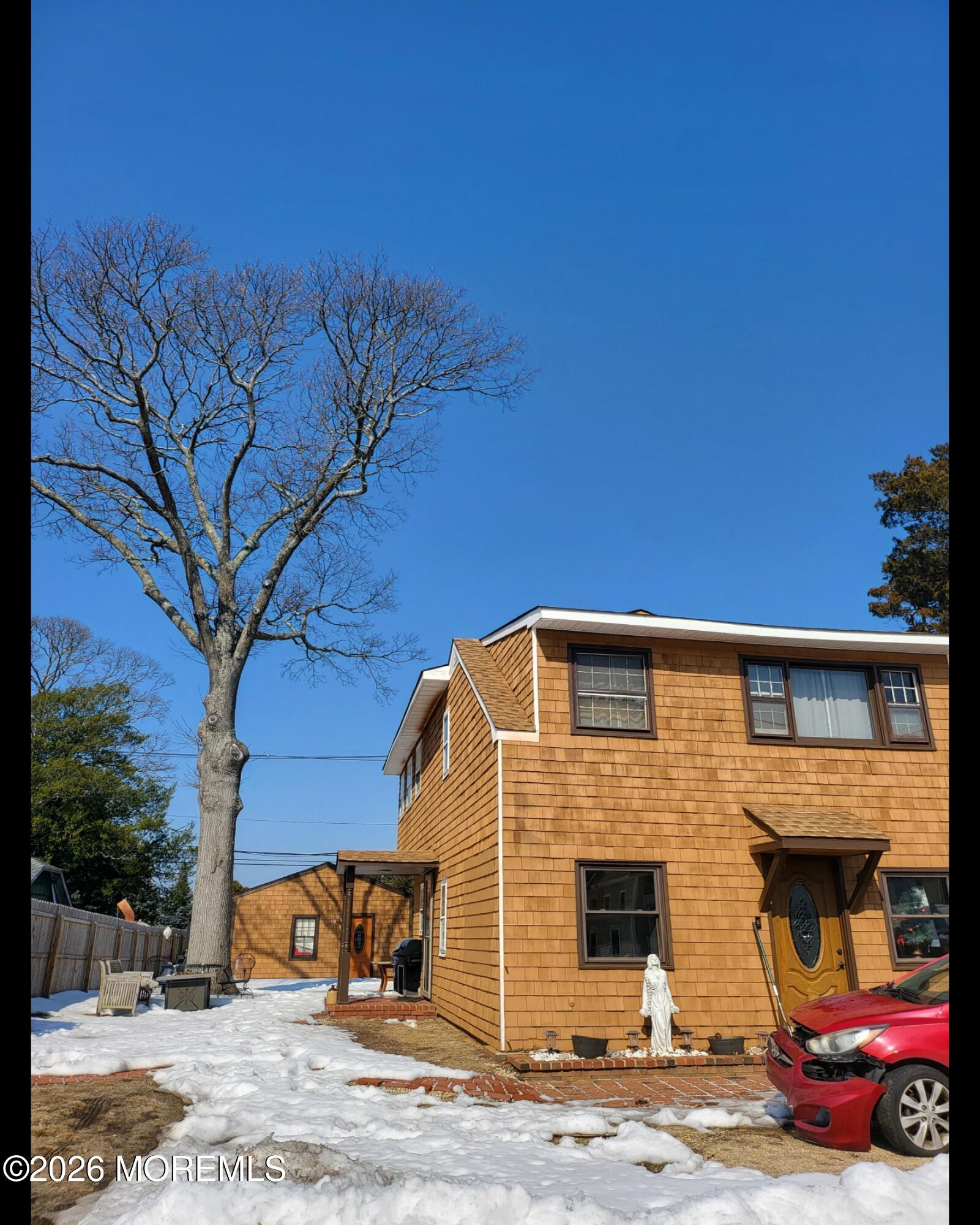 634 Point Avenue Brick, NJ 08724 - Photo 1 of 15 a front view of a house with parking yard