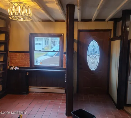 a view of a hallway with entryway