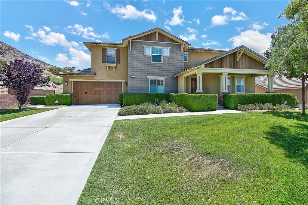 13033 Ridge Rte Road Riverside, CA 92503 - Photo 1 of 1 a front view of a house with a yard