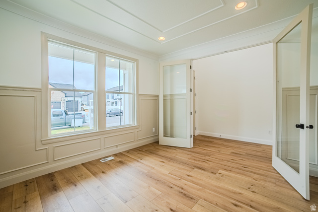 223 South Cottonwood Road, Unit 7501 Vineyard, UT 84059 - Photo 43 of 45 Room featuring wood-finish flooring, wainscoting details, and a coffered ceiling with recessed lighting