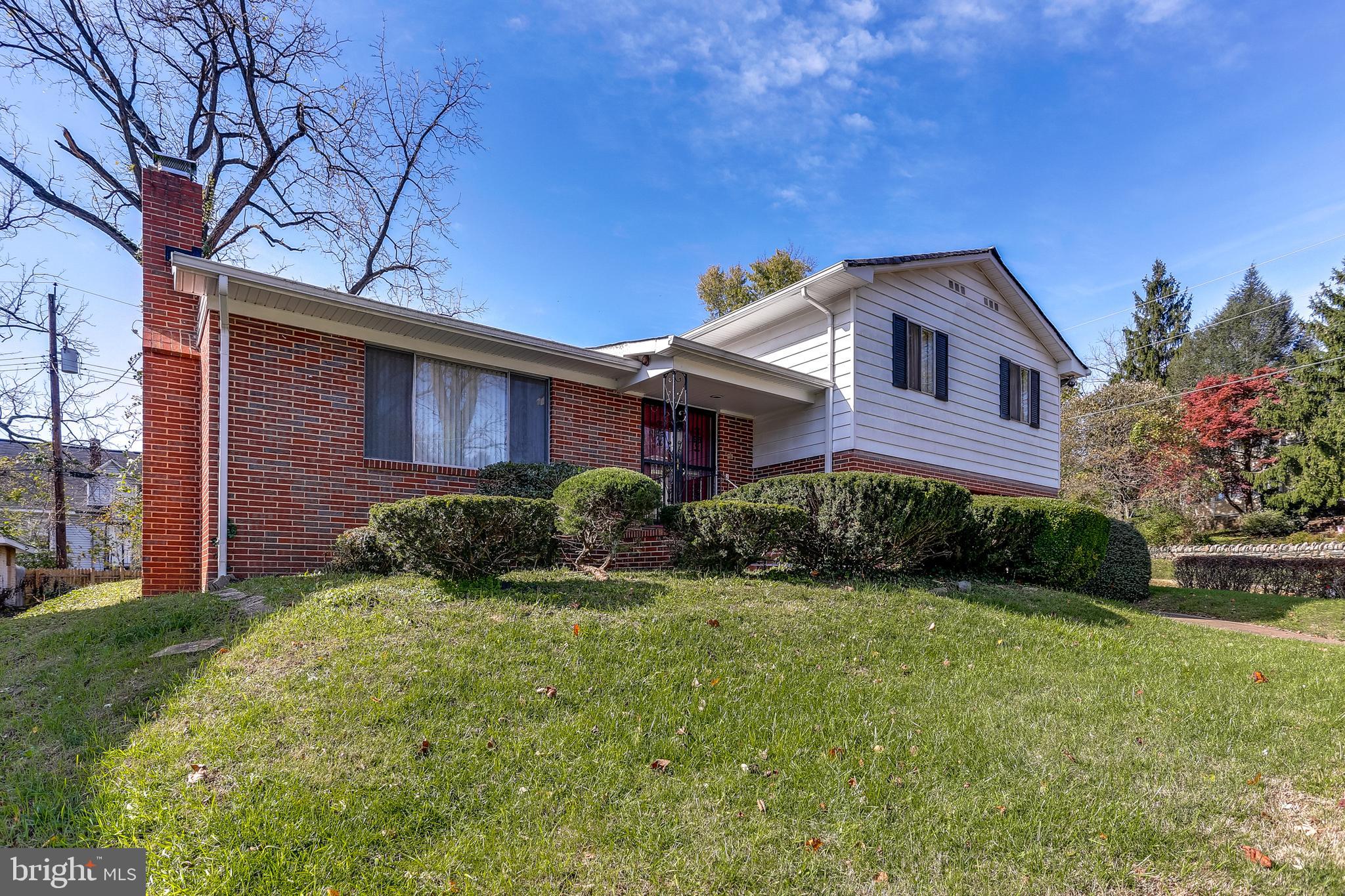 2408 Monticello Road Baltimore, MD 21216 - Photo 2 of 27 a front view of a house with garden