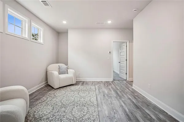 a view of livingroom with furniture and window