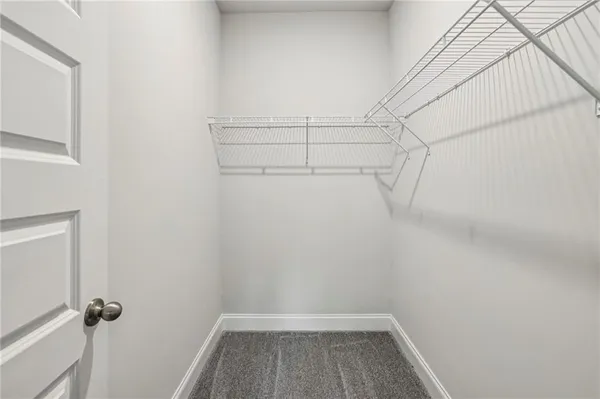 a view of a room with racks on the wall