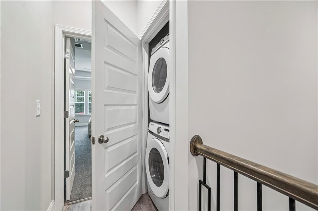 5064 Insperon Lane, Unit 34 Peachtree Corners, GA 30092 - Photo 27 of 48 a utility room with dryer and washer