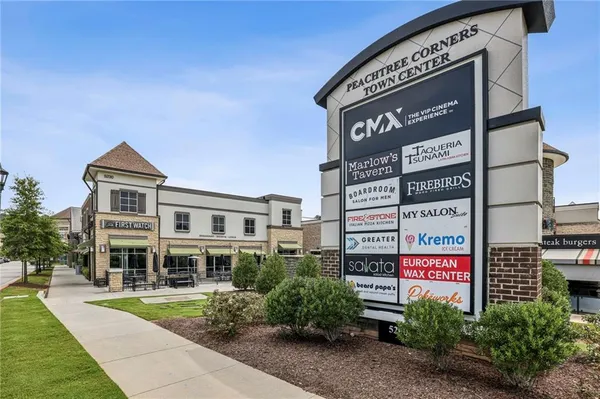 a view of street with sitting area