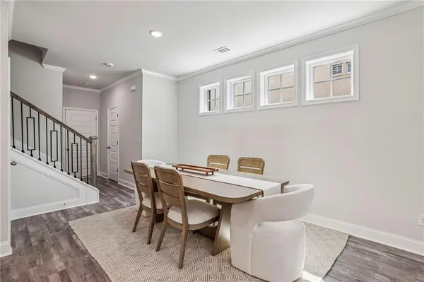 a view of a dining room with furniture