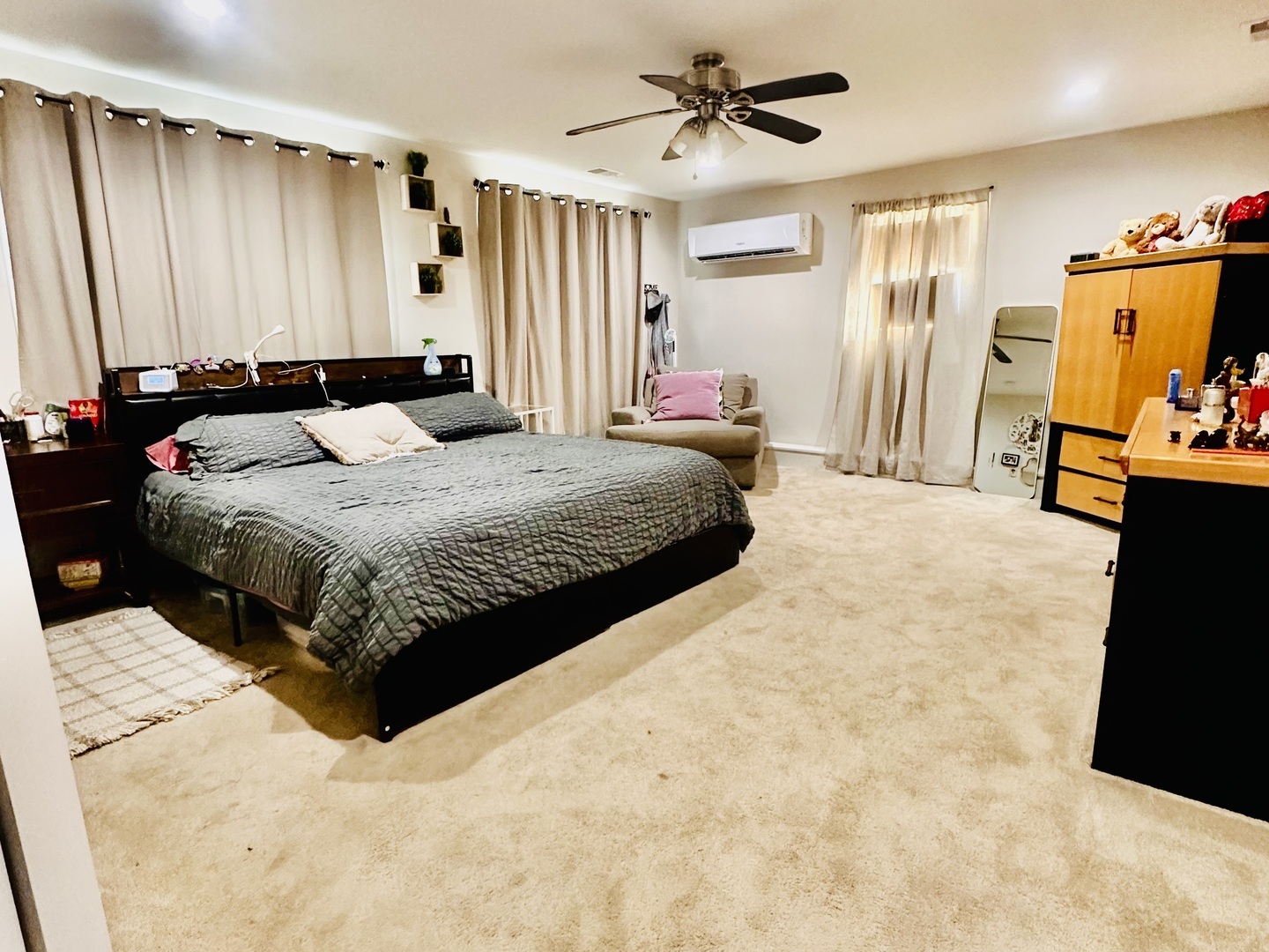 4501 185th Street Country Club Hills, IL 60478 - Photo 14 of 27 a bedroom with a bed dresser and a flat tv screen