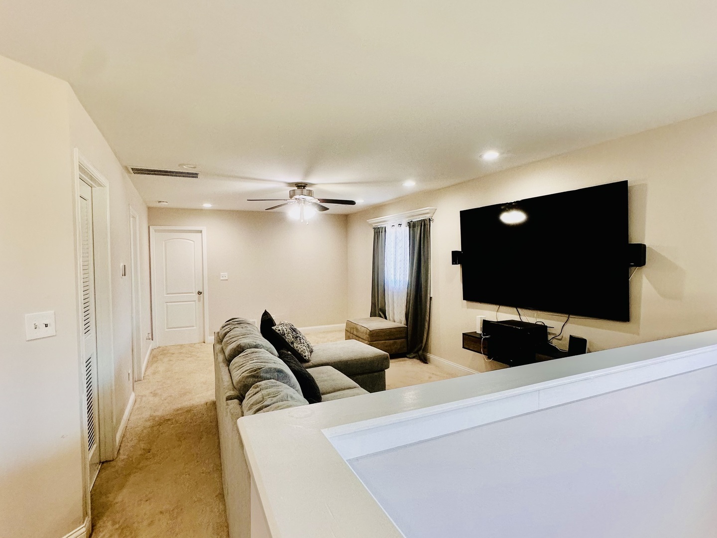 4501 185th Street Country Club Hills, IL 60478 - Photo 18 of 27 a living room with furniture and a flat screen tv