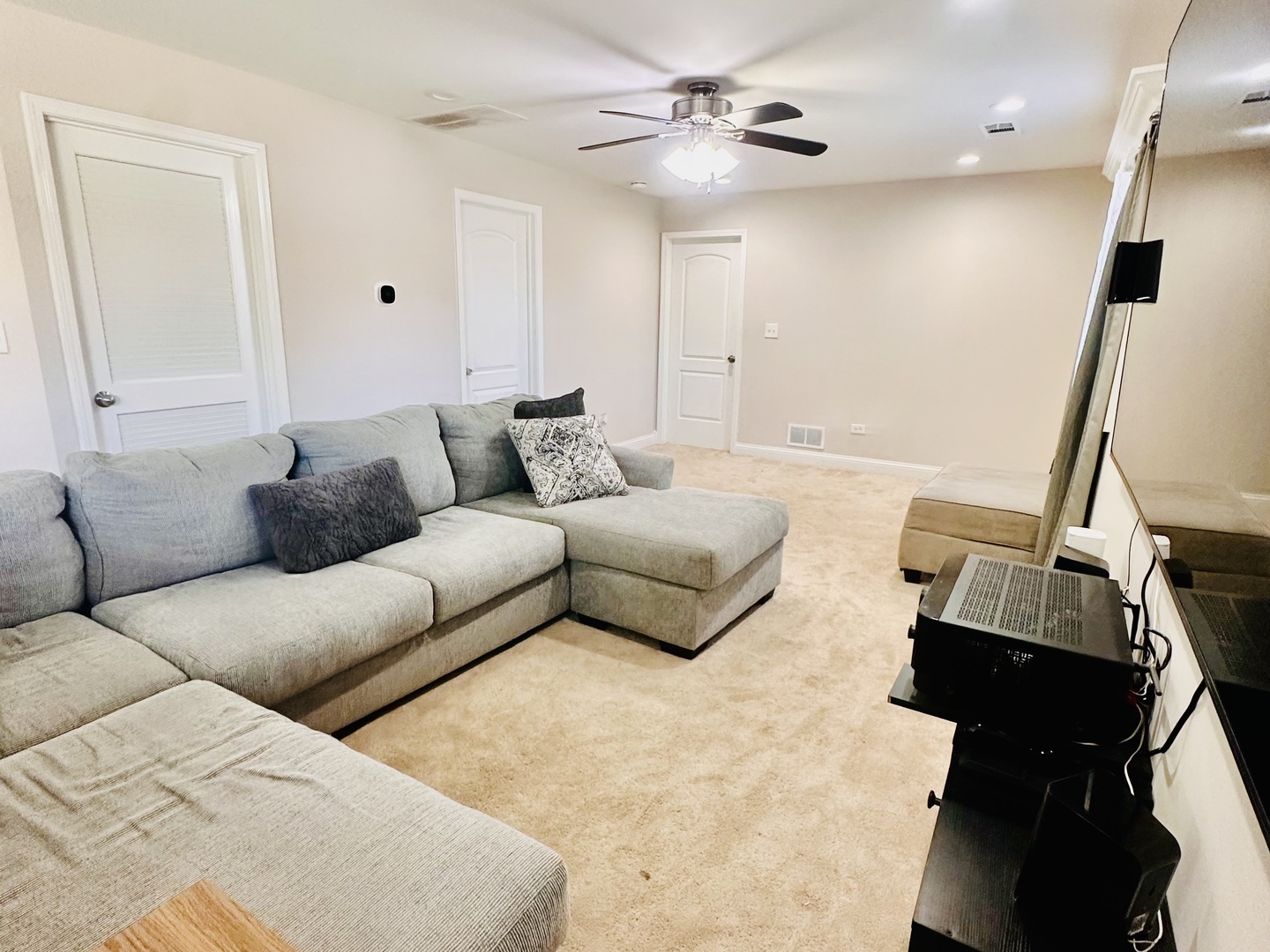 4501 185th Street Country Club Hills, IL 60478 - Photo 20 of 27 a living room with furniture and a flat screen tv