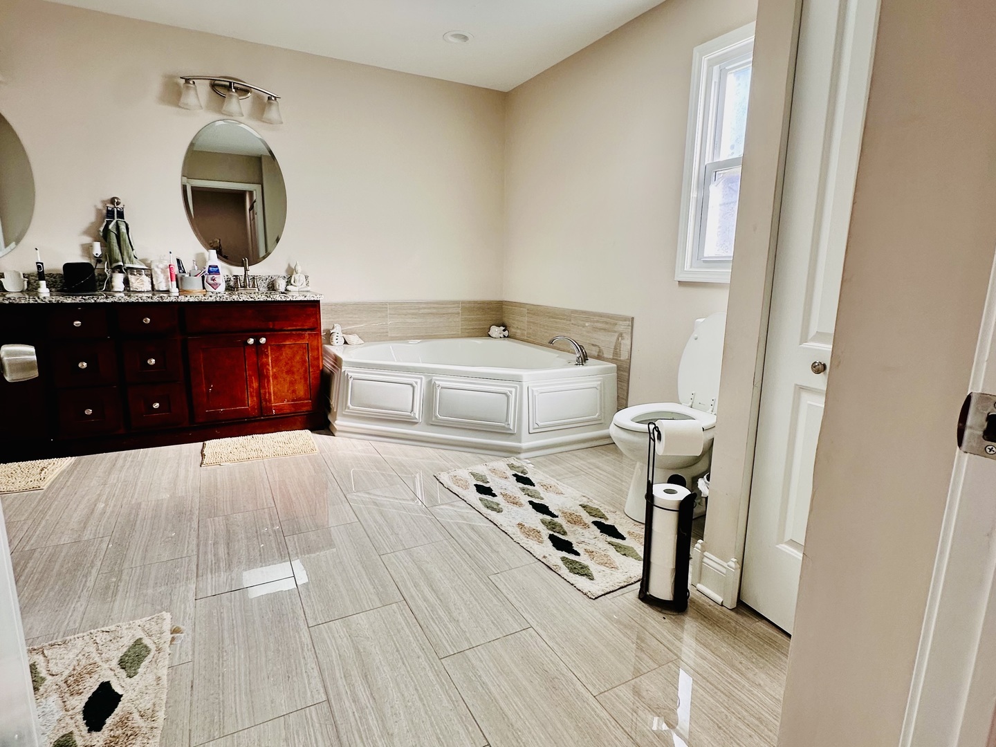 4501 185th Street Country Club Hills, IL 60478 - Photo 24 of 27 a bathroom with a sink vanity granite and a mirror