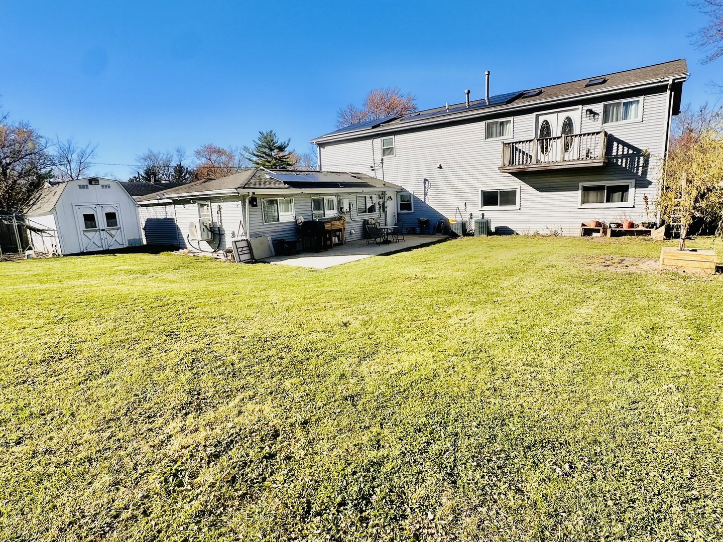 4501 185th Street Country Club Hills, IL 60478 - Photo 3 of 27 a front view of a house with swimming pool
