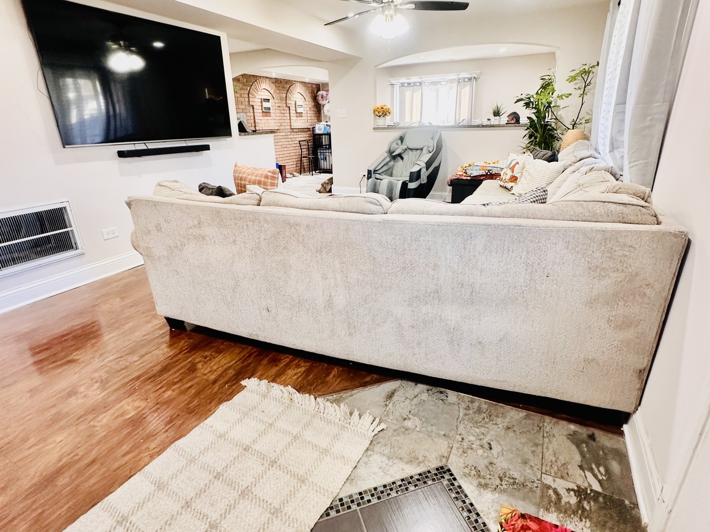 4501 185th Street Country Club Hills, IL 60478 - Photo 6 of 27 a living room with a flat screen tv and a couch
