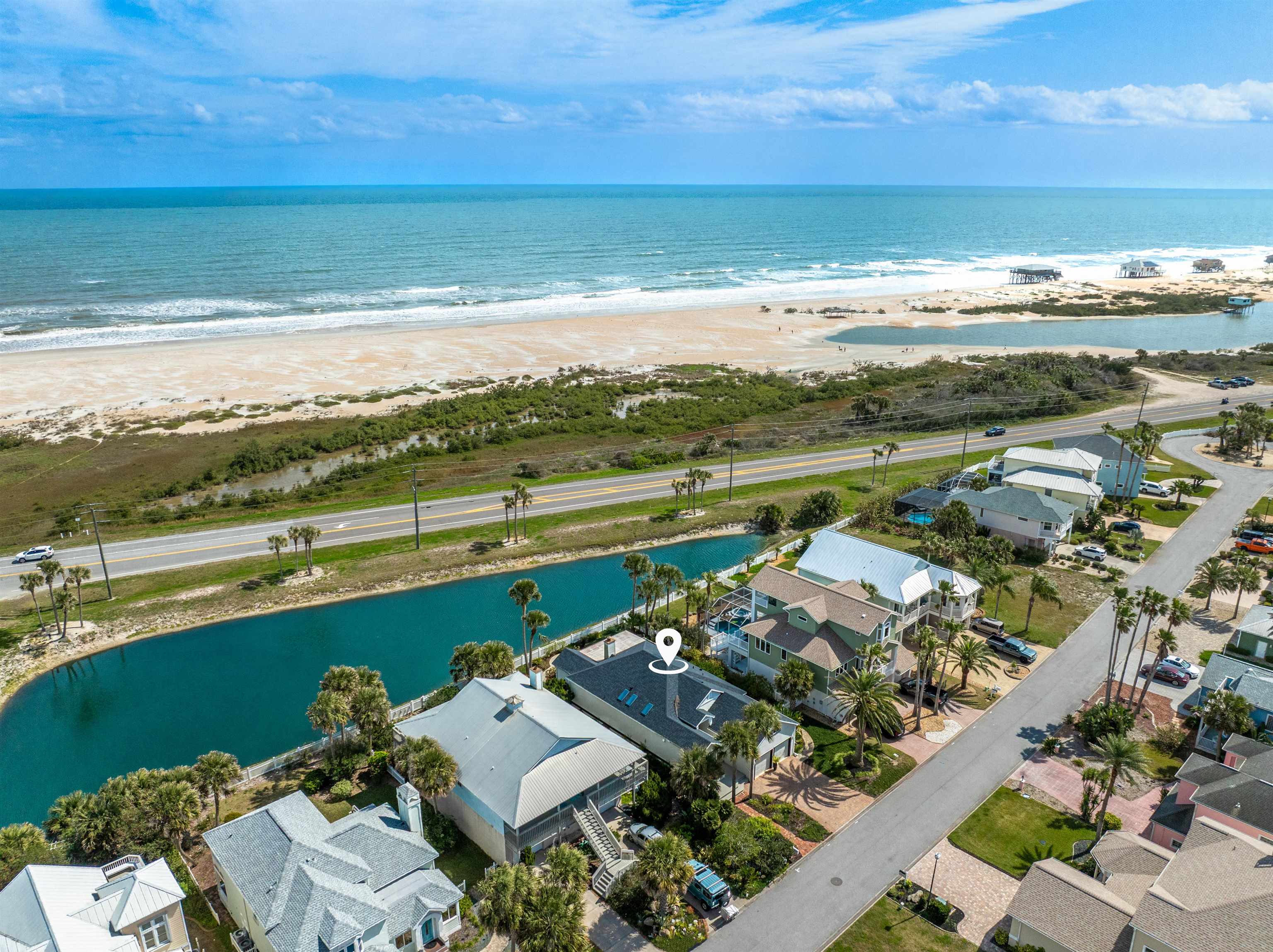 9244 July Lane St. Augustine, FL 32080 - Photo 45 of 66 a view of an ocean and a mountain