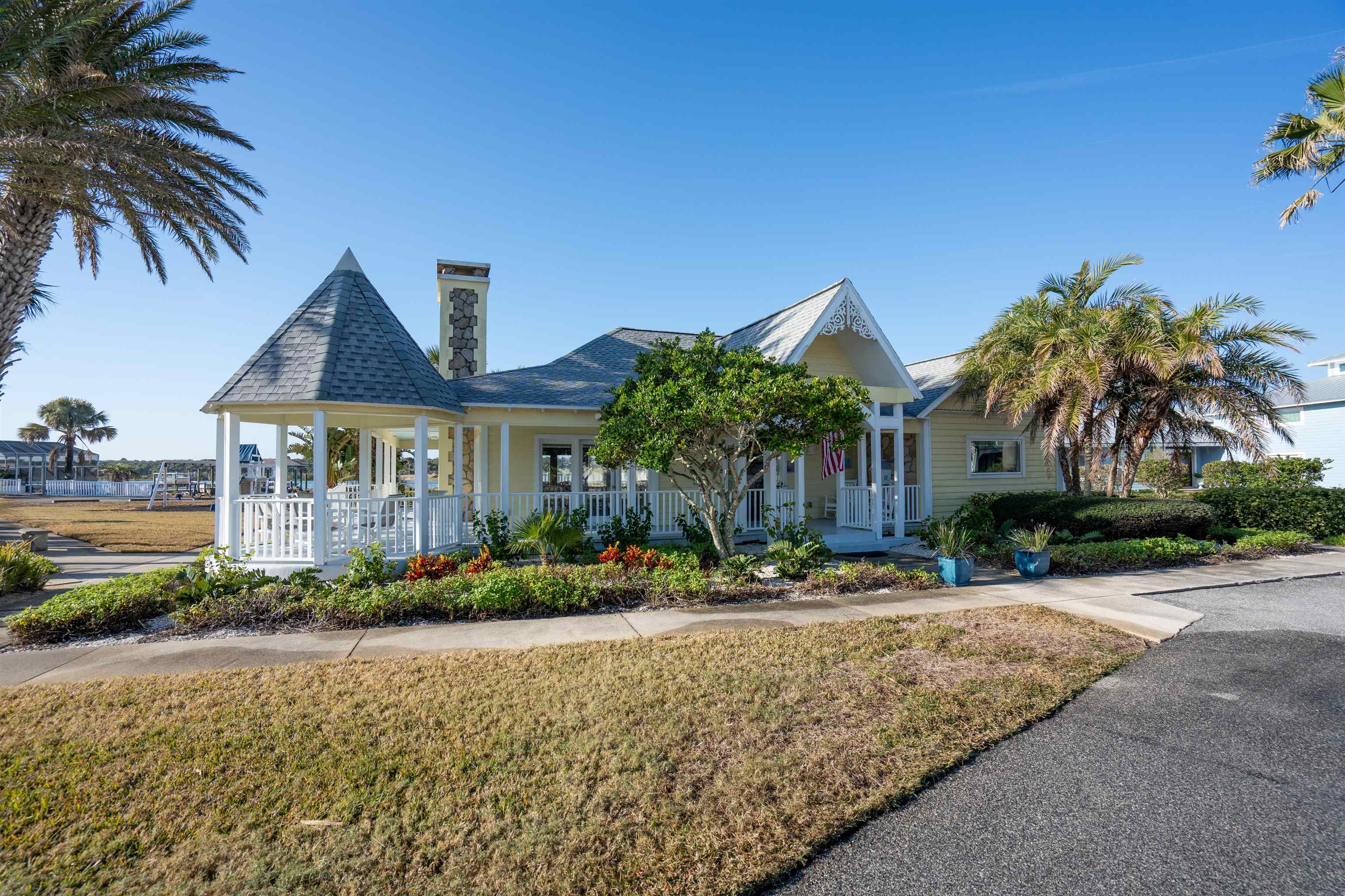 9244 July Lane St. Augustine, FL 32080 - Photo 50 of 66 a front view of house with yard and green space
