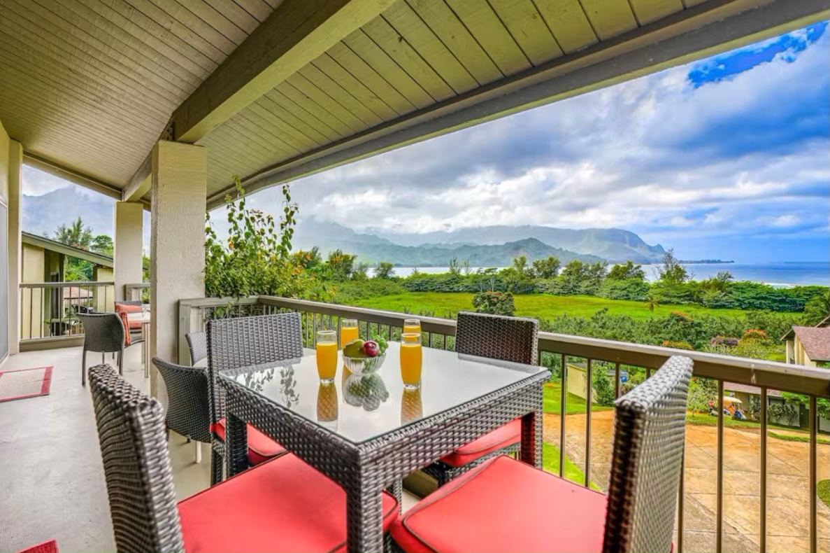 5380 Honoiki Road, Unit J33 Princeville, HI 96722 - Photo 12 of 30 a view of city from a balcony with seating space