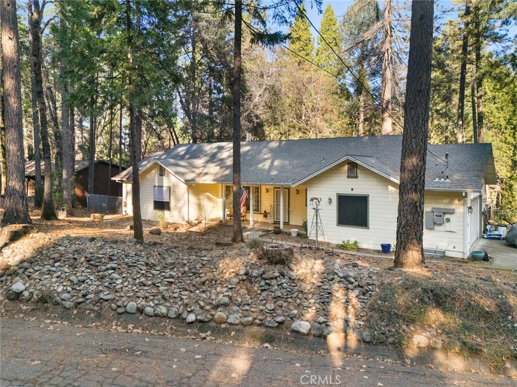 6341 Amherst Way Magalia, CA 95954 - Photo 17 of 28 a view of a house with a yard covered in snow