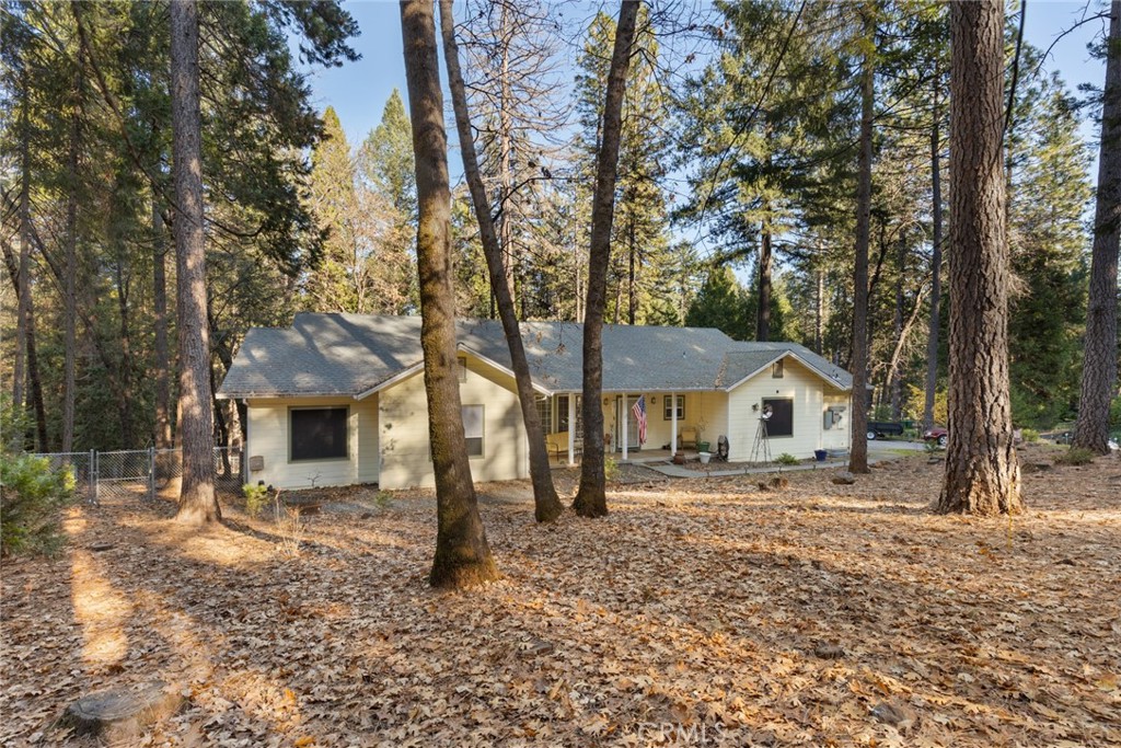 6341 Amherst Way Magalia, CA 95954 - Photo 18 of 28 a view of a house with a yard covered in snow