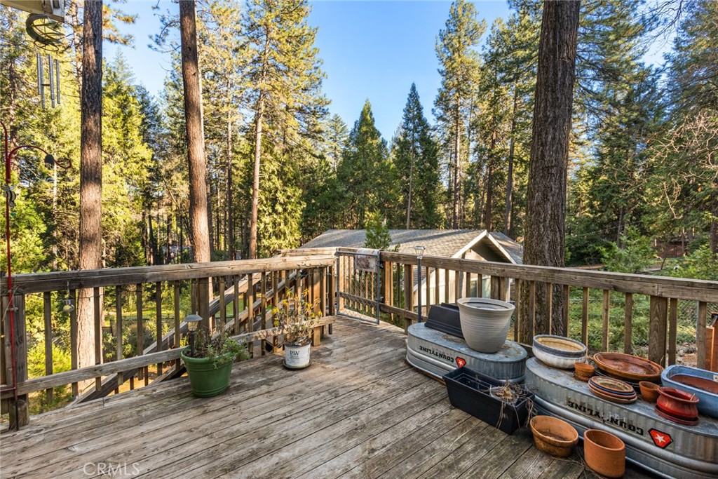 6341 Amherst Way Magalia, CA 95954 - Photo 23 of 28 a view of balcony with wooden floor and outdoor seating