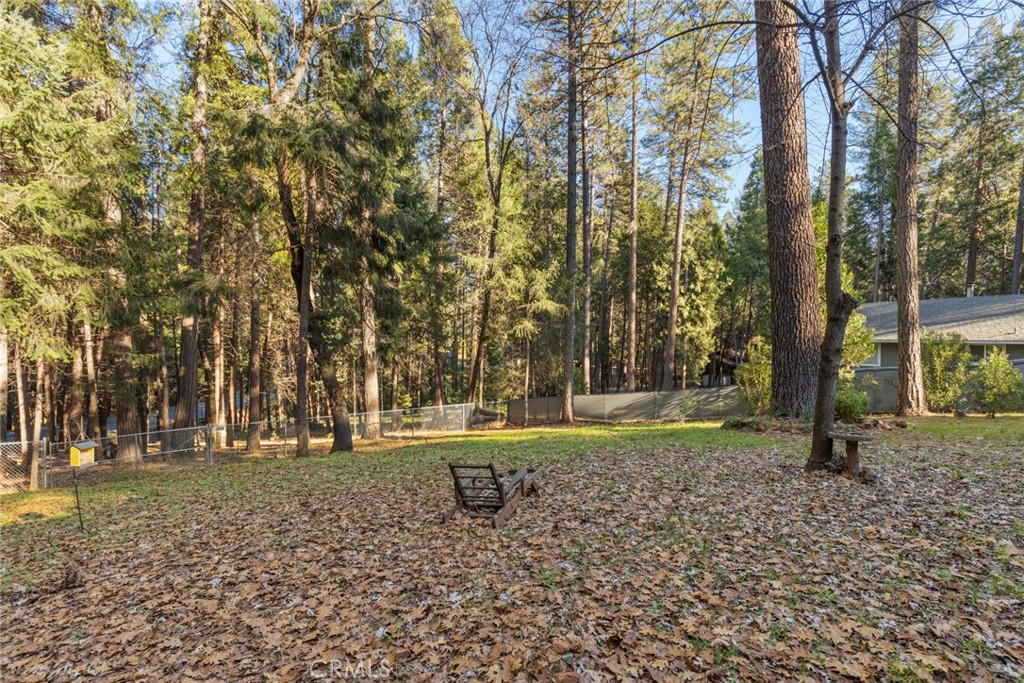 6341 Amherst Way Magalia, CA 95954 - Photo 26 of 28 a backyard of a house with lots of green space