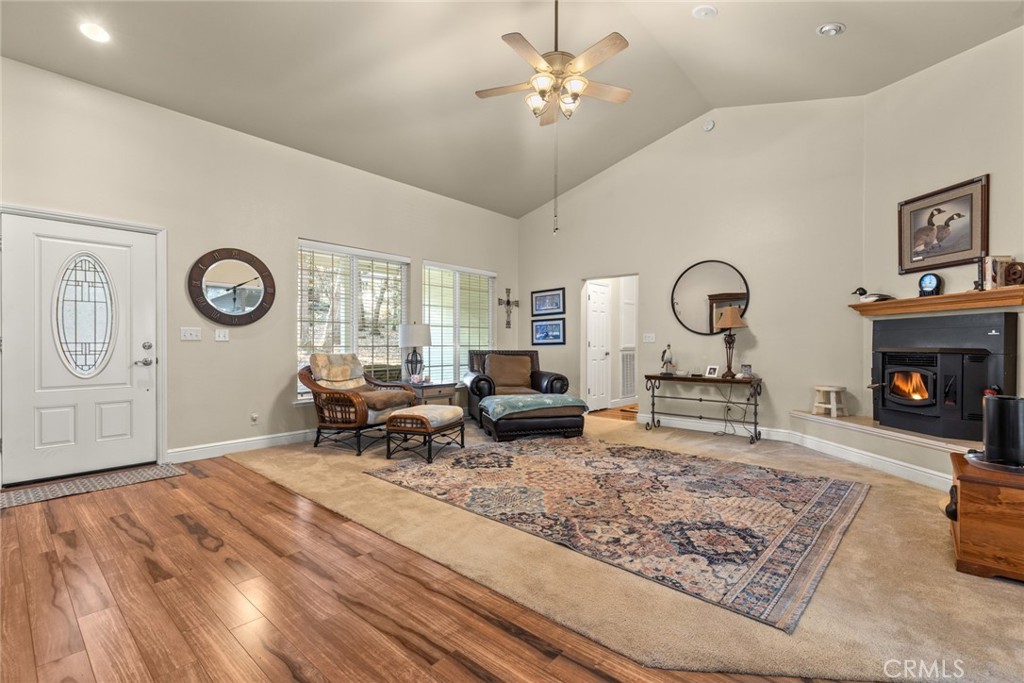 6341 Amherst Way Magalia, CA 95954 - Photo 3 of 28 a living room with furniture and a fireplace