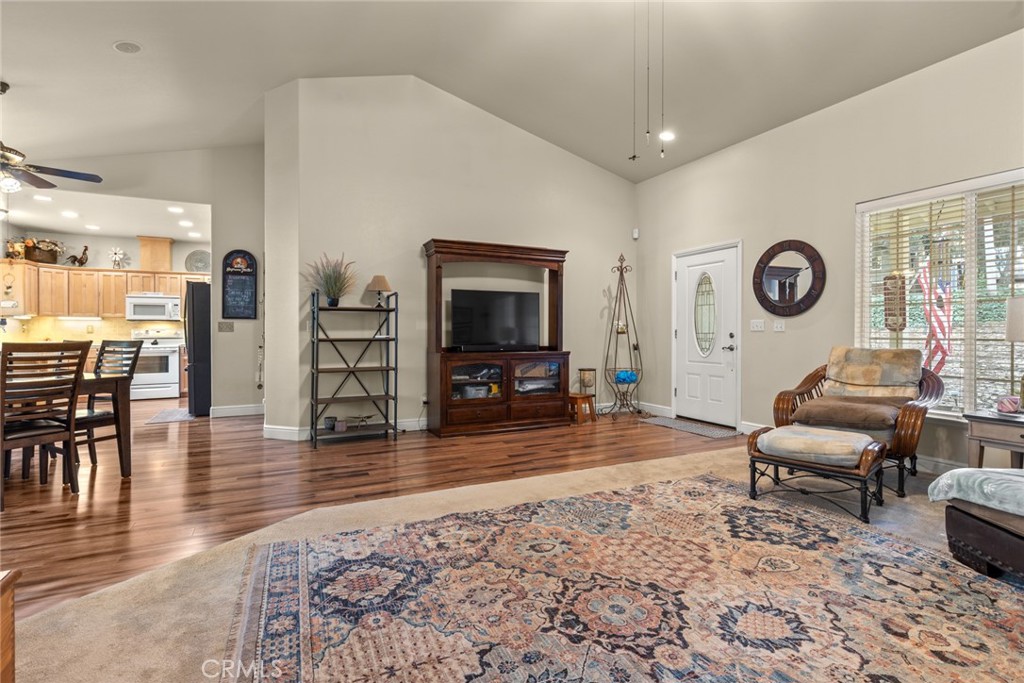 6341 Amherst Way Magalia, CA 95954 - Photo 6 of 28 a living room with furniture and a flat screen tv