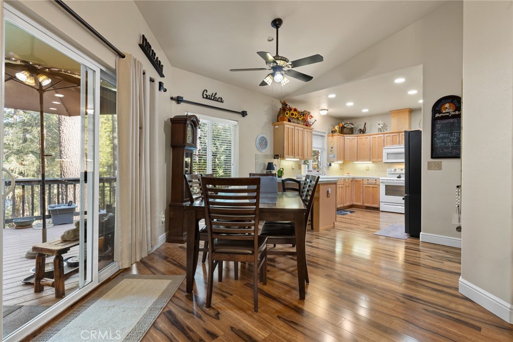 6341 Amherst Way Magalia, CA 95954 - Photo 7 of 28 a view of a dining room with furniture window and wooden floor
