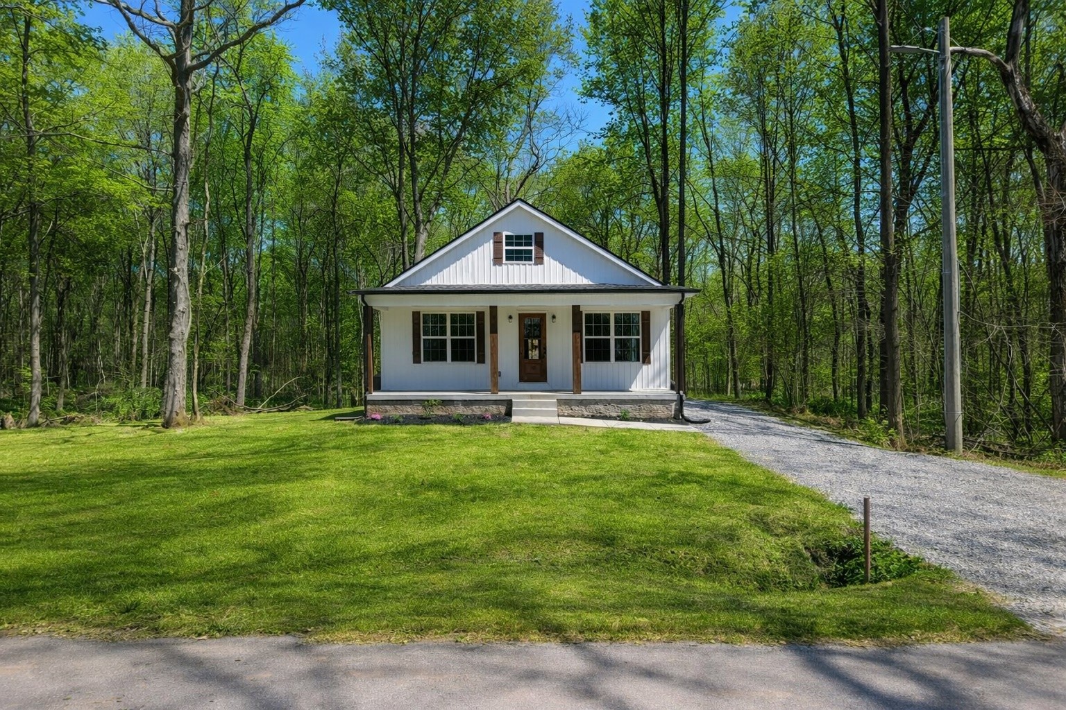 397 Hightower Road Elkton, KY 42220 - Photo 1 of 7 a front view of a house with a yard