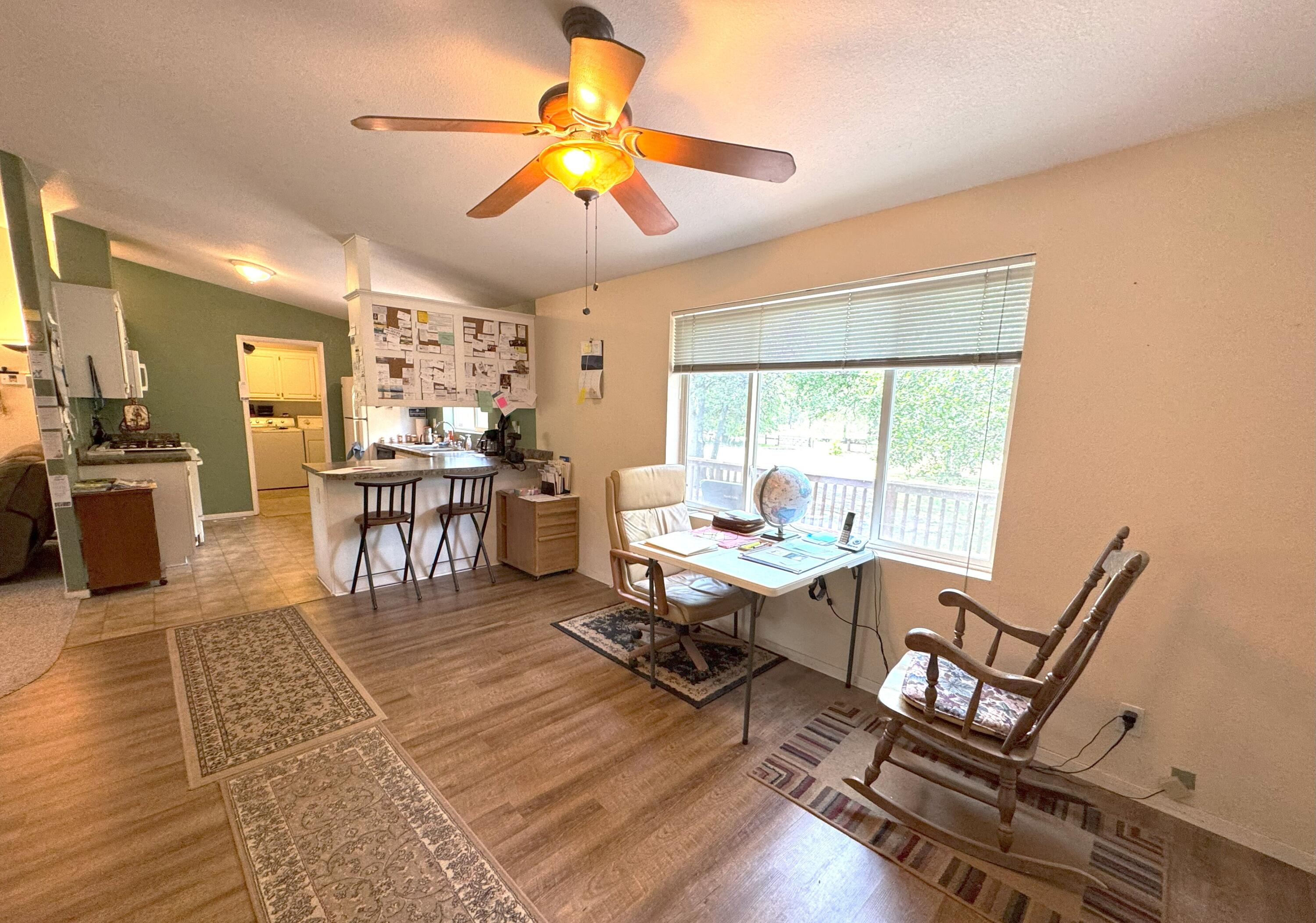 29093 Day Road McArthur, CA 96056 - Photo 11 of 39 a view of a dining room with furniture window and wooden floor