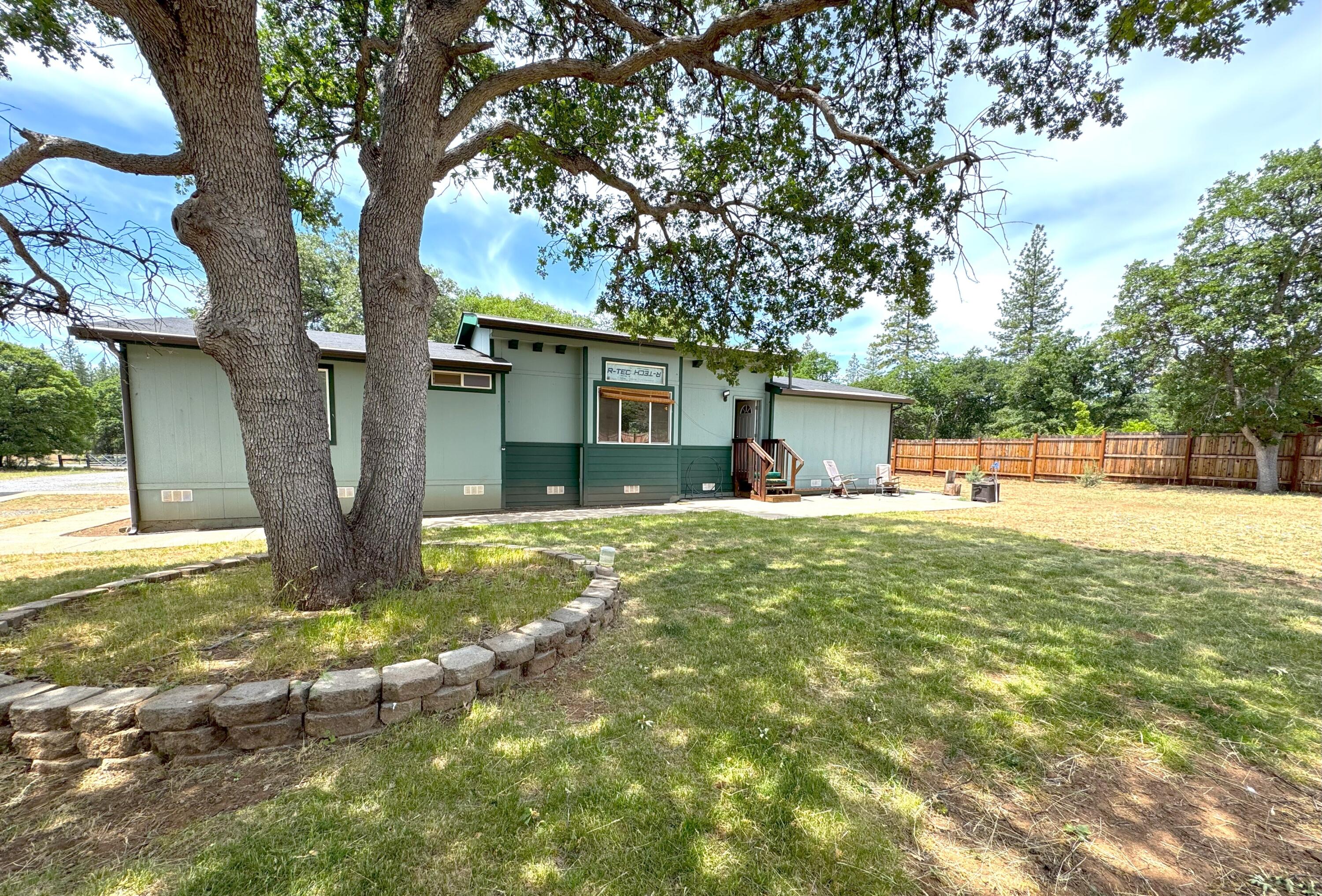 29093 Day Road McArthur, CA 96056 - Photo 2 of 39 a view of a house with backyard and a tree