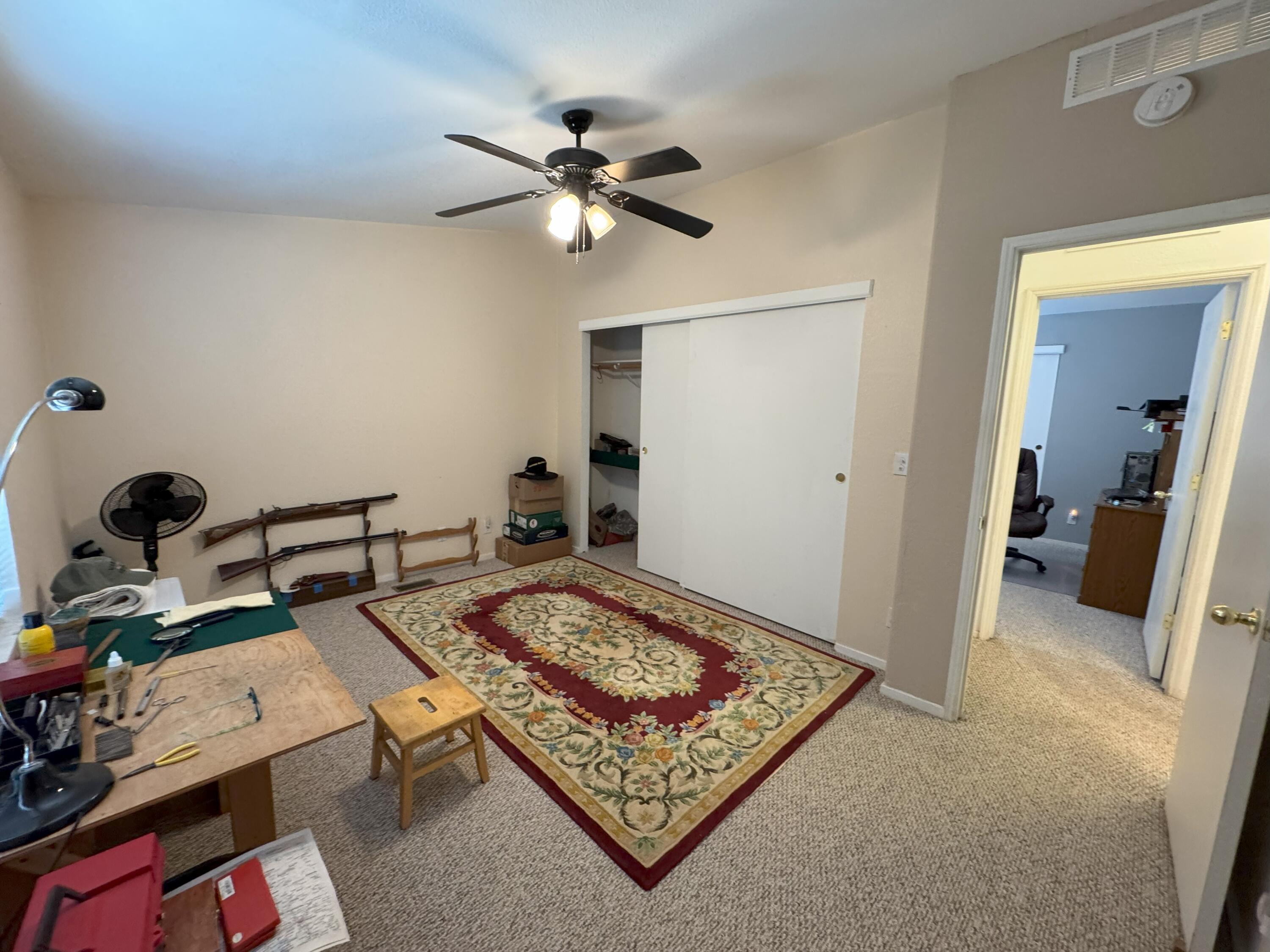 29093 Day Road McArthur, CA 96056 - Photo 23 of 39 a living room with furniture and a rug