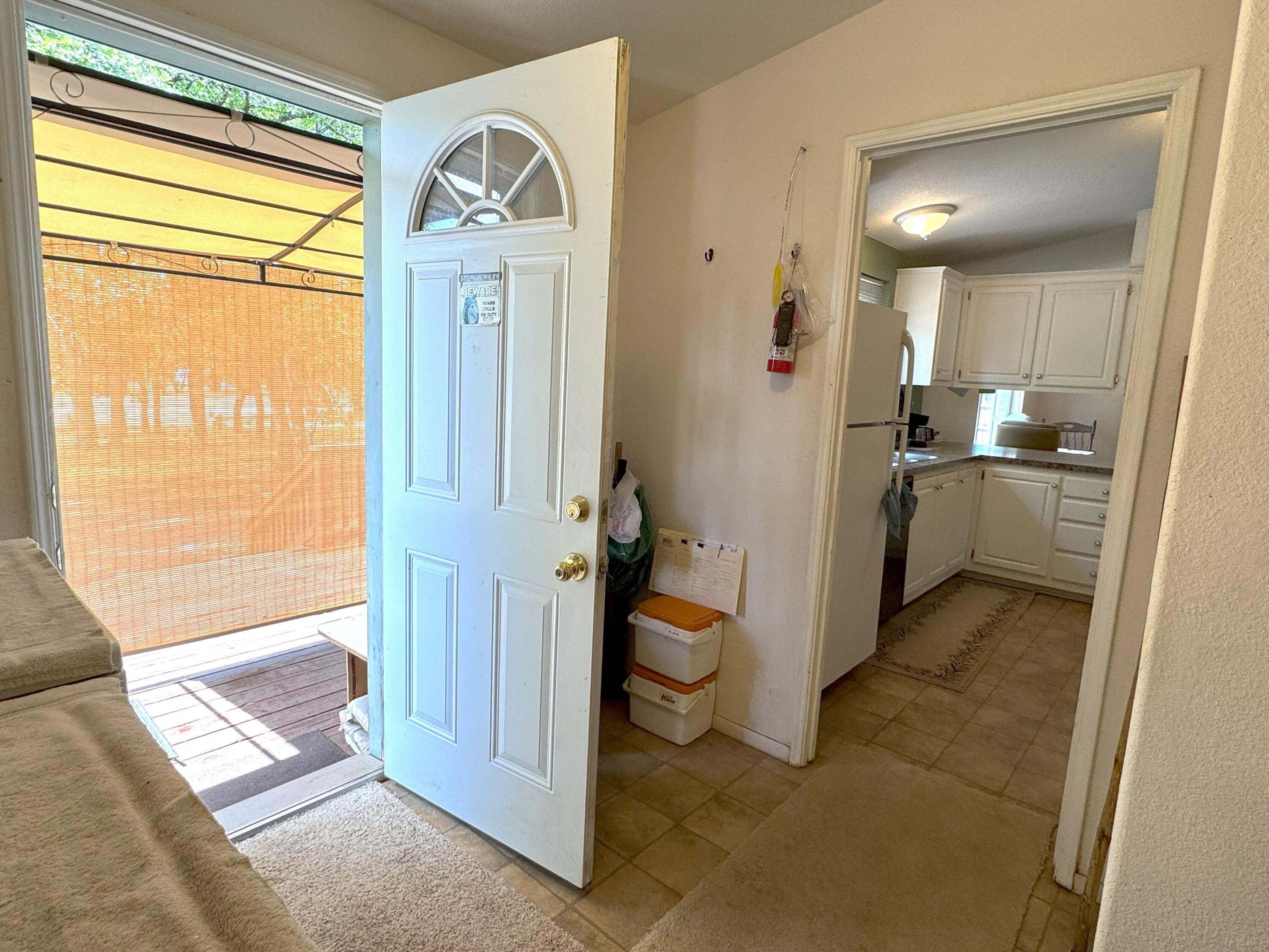 29093 Day Road McArthur, CA 96056 - Photo 29 of 39 a bathroom with a granite countertop sink a mirror and a bathtub