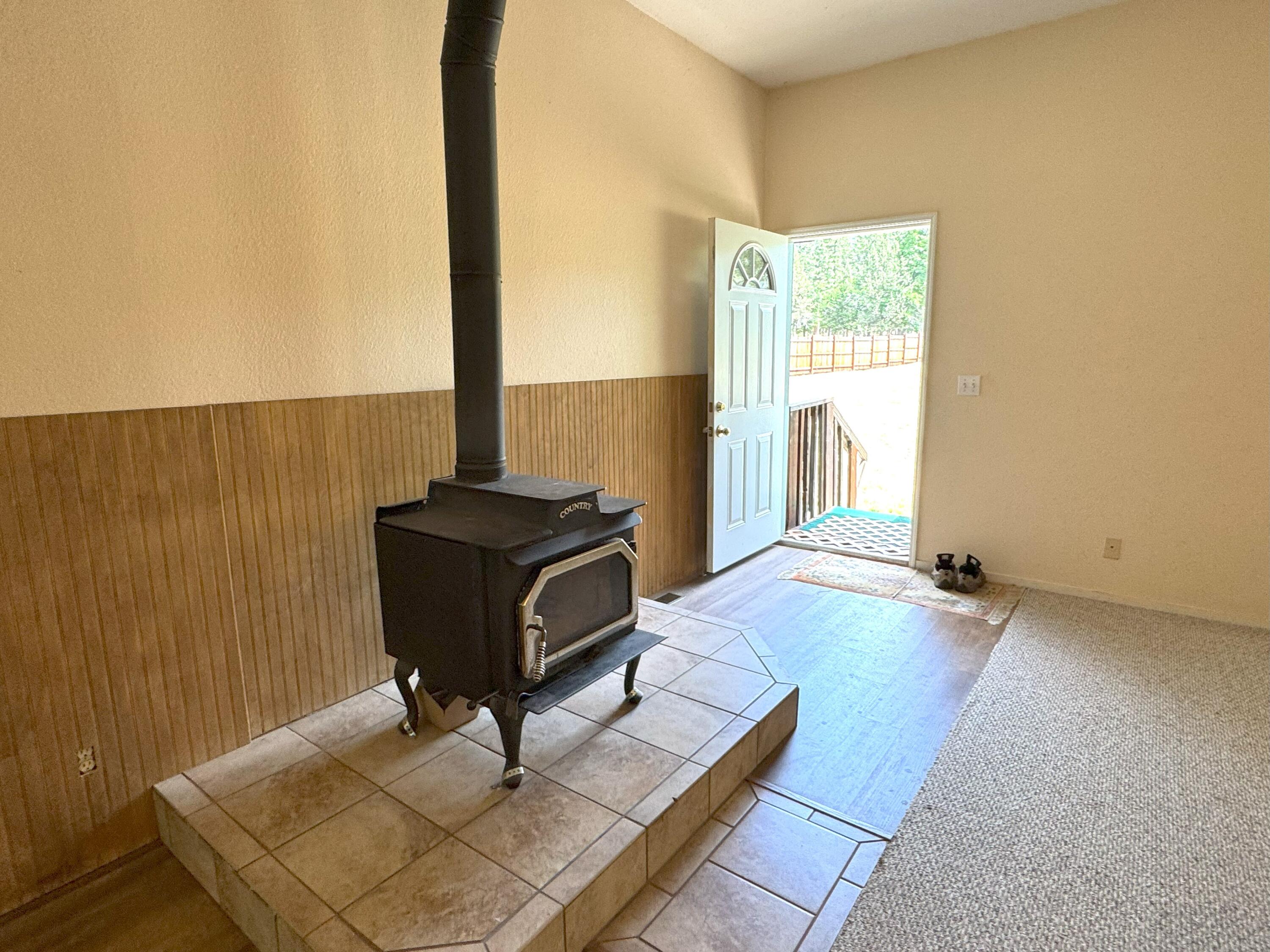 29093 Day Road McArthur, CA 96056 - Photo 6 of 39 a living room with a rug