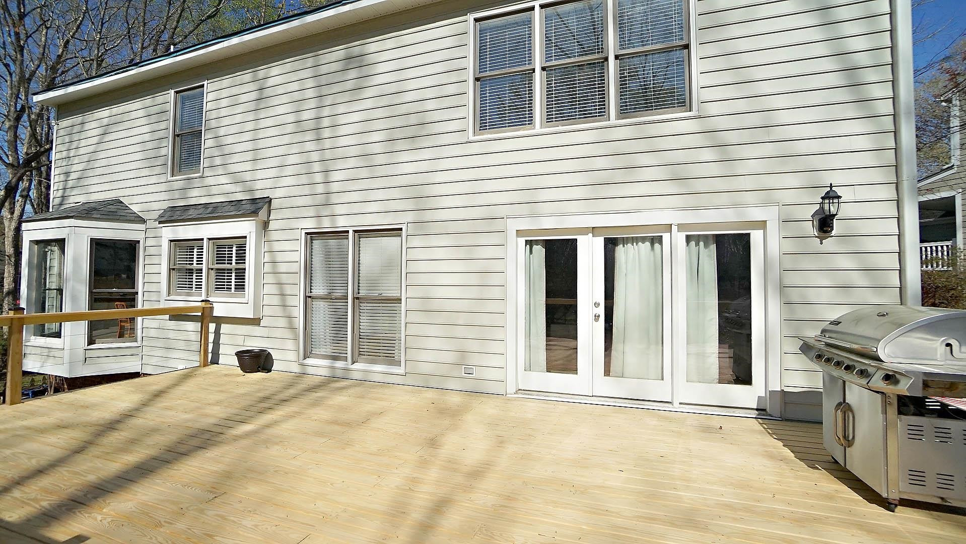 8300 Grey Abbey Place Raleigh, NC 27615 - Photo 32 of 34 500 sq ft deck private great for grilling/entertaining. Rear of Home Deck