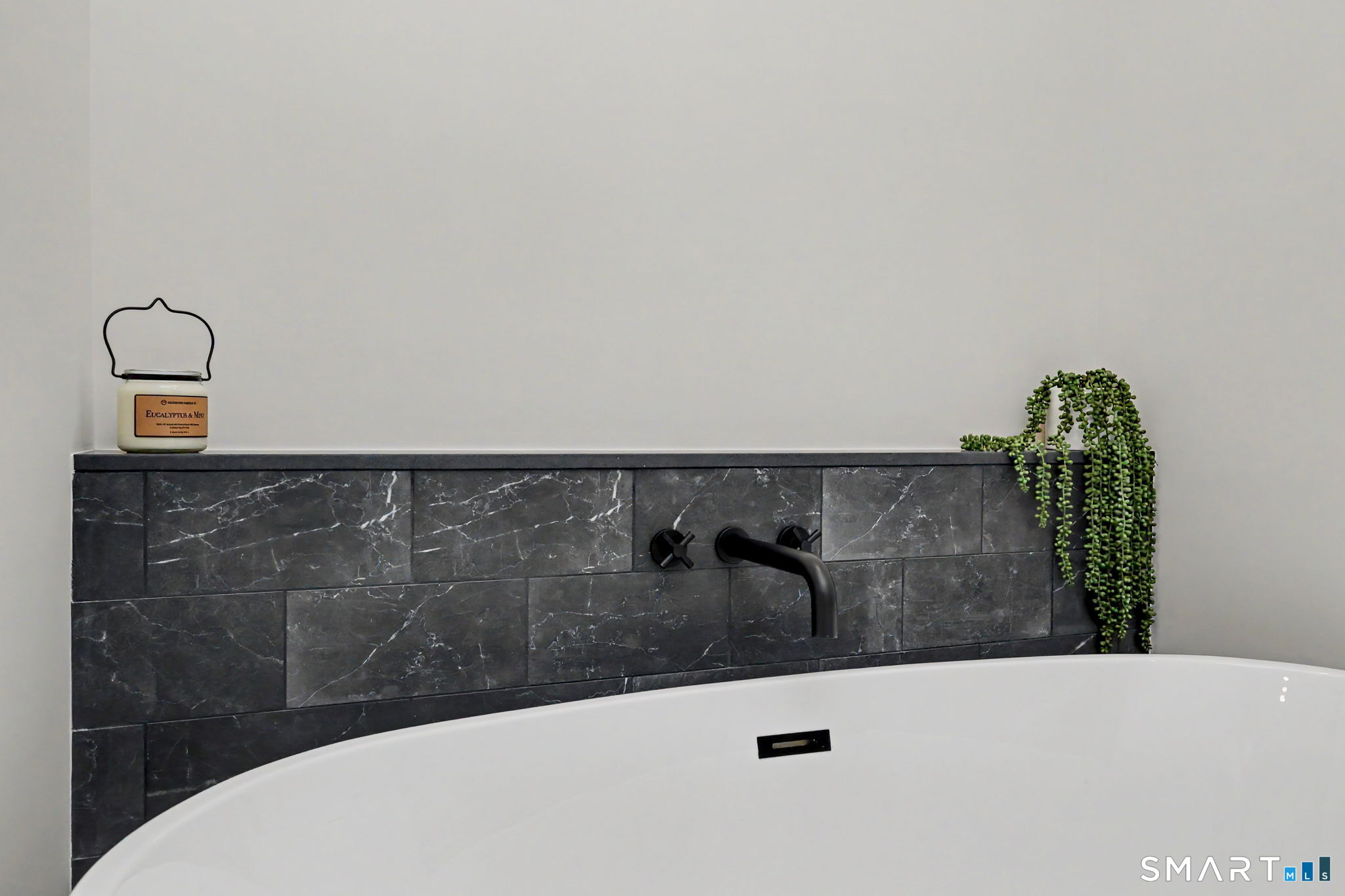 91 Lockwood Road Fairfield, CT 06825 - Photo 27 of 38 a bathroom with a bathtub