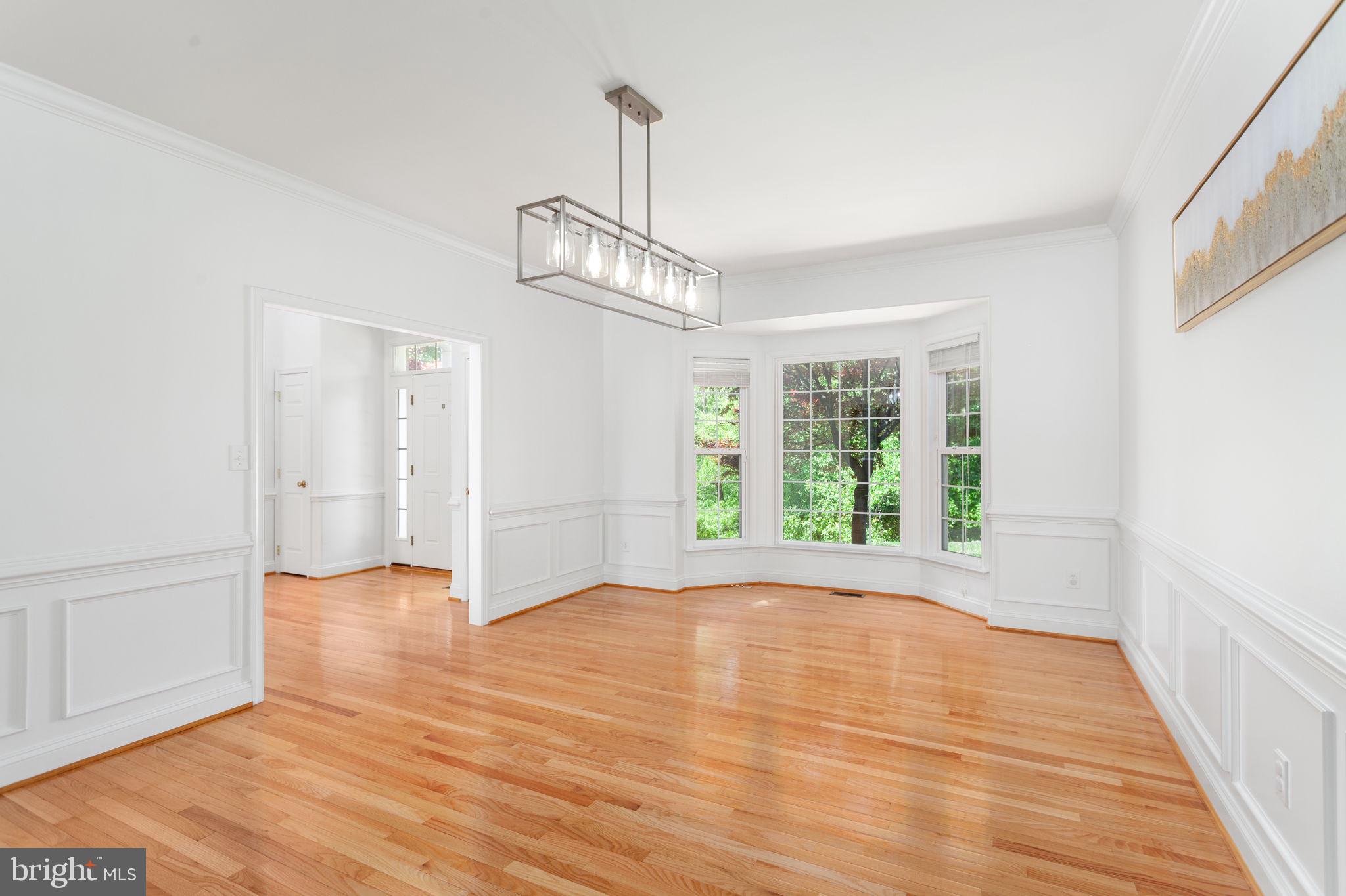 70 Sentinel Ridge Lane Stafford, VA 22554 - Photo 18 of 53 a view of empty room with wooden floor and fan