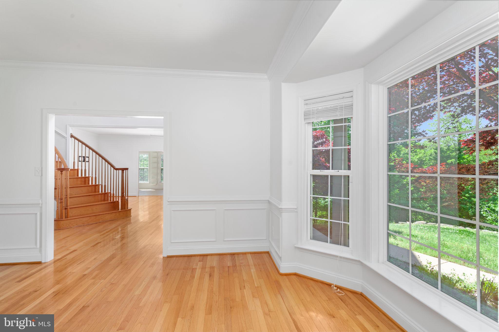 70 Sentinel Ridge Lane Stafford, VA 22554 - Photo 19 of 53 a view of empty room with wooden floor and fan