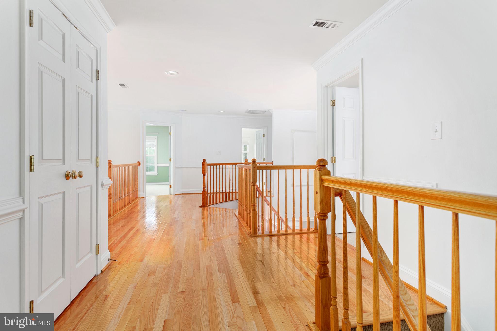 70 Sentinel Ridge Lane Stafford, VA 22554 - Photo 22 of 53 a view of a hallway with wooden floor