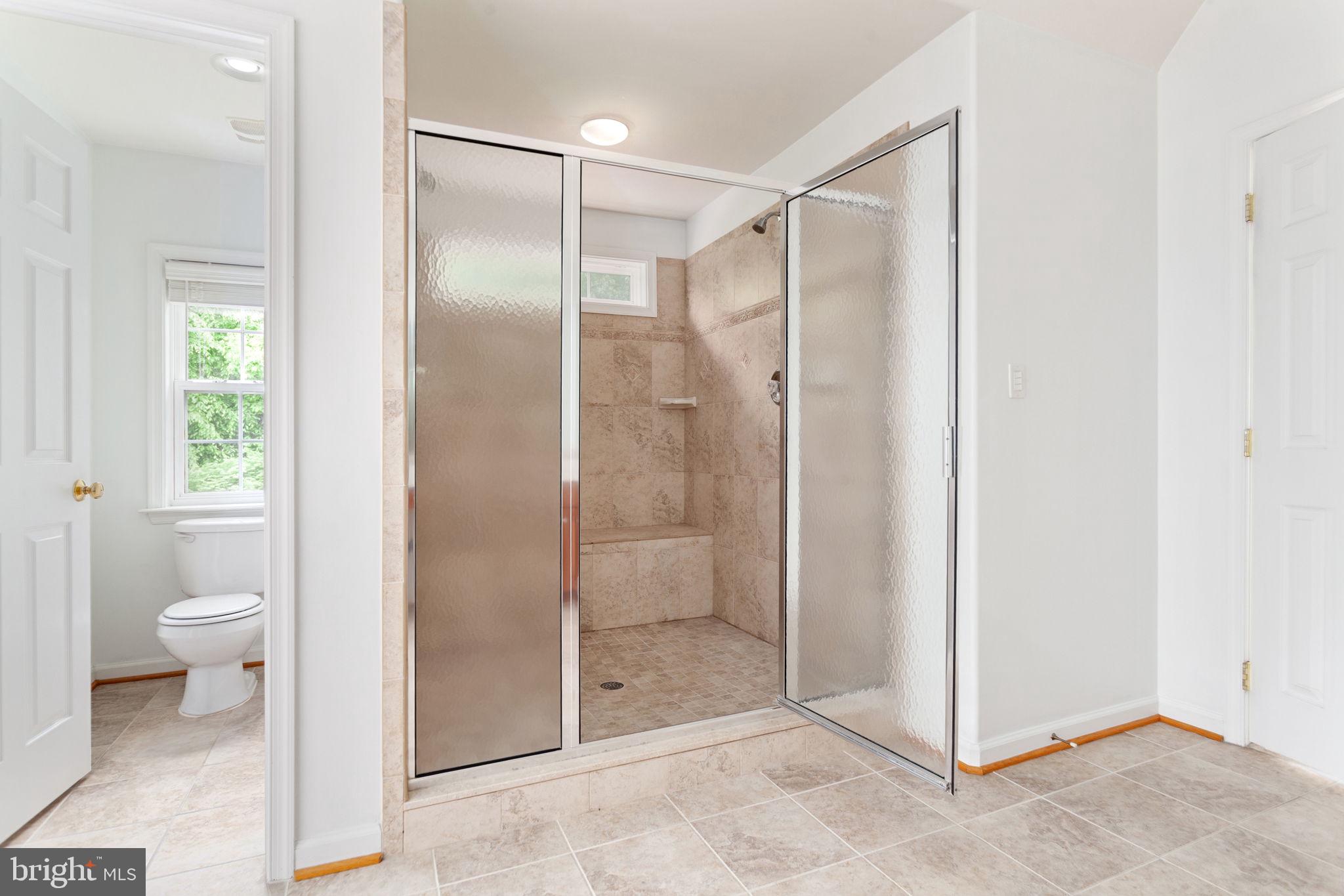 70 Sentinel Ridge Lane Stafford, VA 22554 - Photo 28 of 53 a bathroom with a shower and a toilet