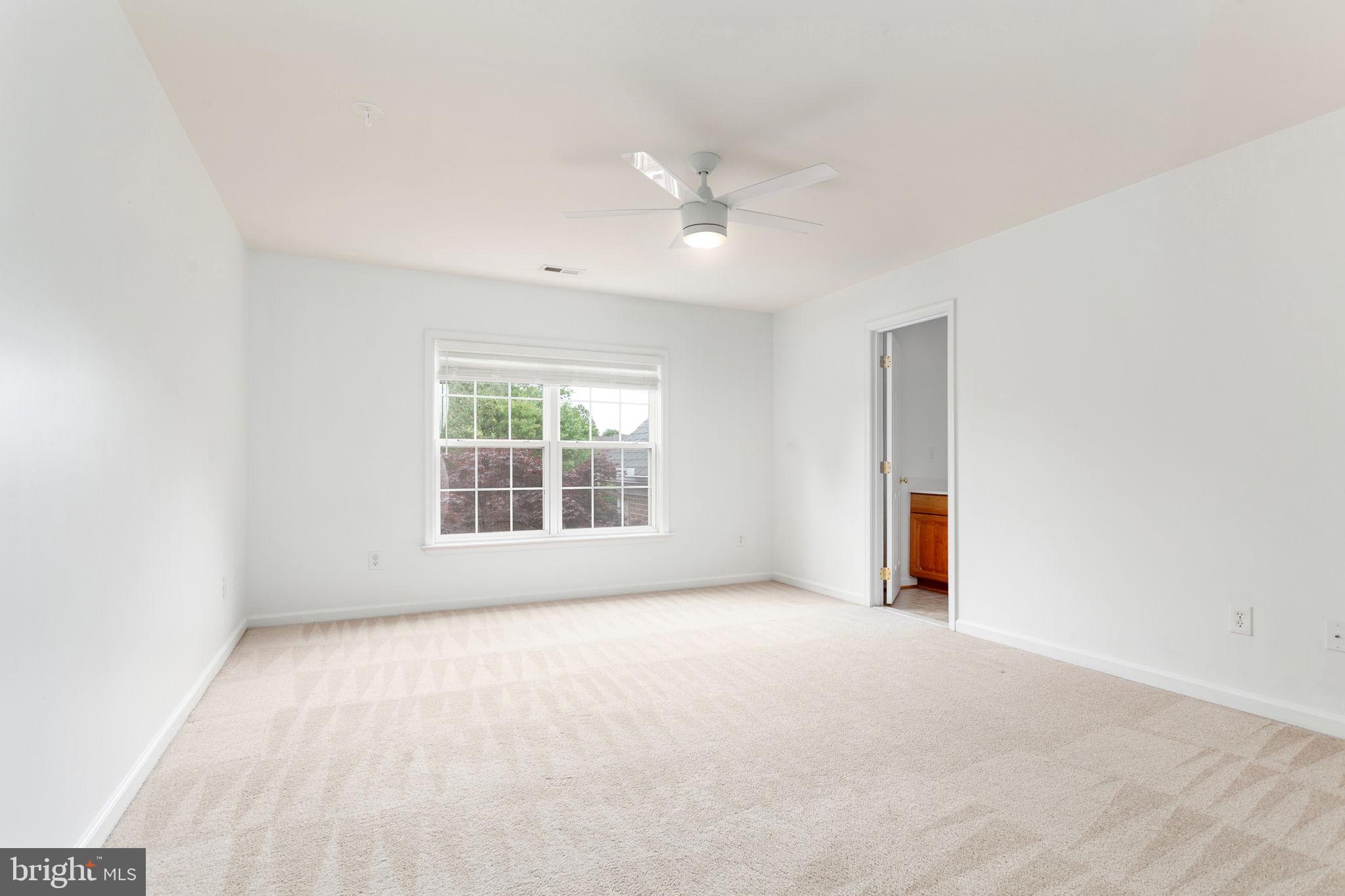 70 Sentinel Ridge Lane Stafford, VA 22554 - Photo 29 of 53 an empty room with a empty space and windows