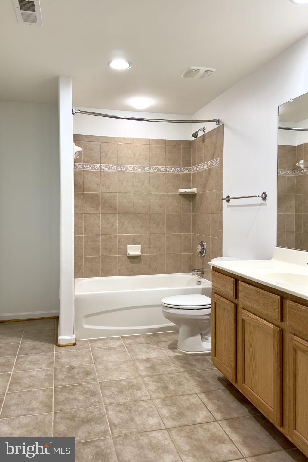70 Sentinel Ridge Lane Stafford, VA 22554 - Photo 40 of 53 a bathroom with a bathtub and a shower