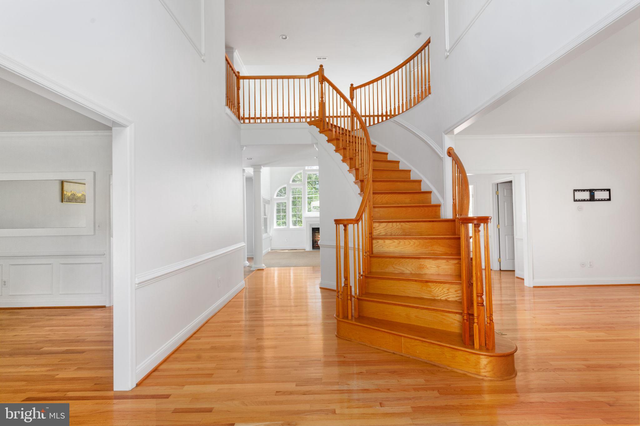 70 Sentinel Ridge Lane Stafford, VA 22554 - Photo 4 of 53 a view of entryway and hall with wooden floor