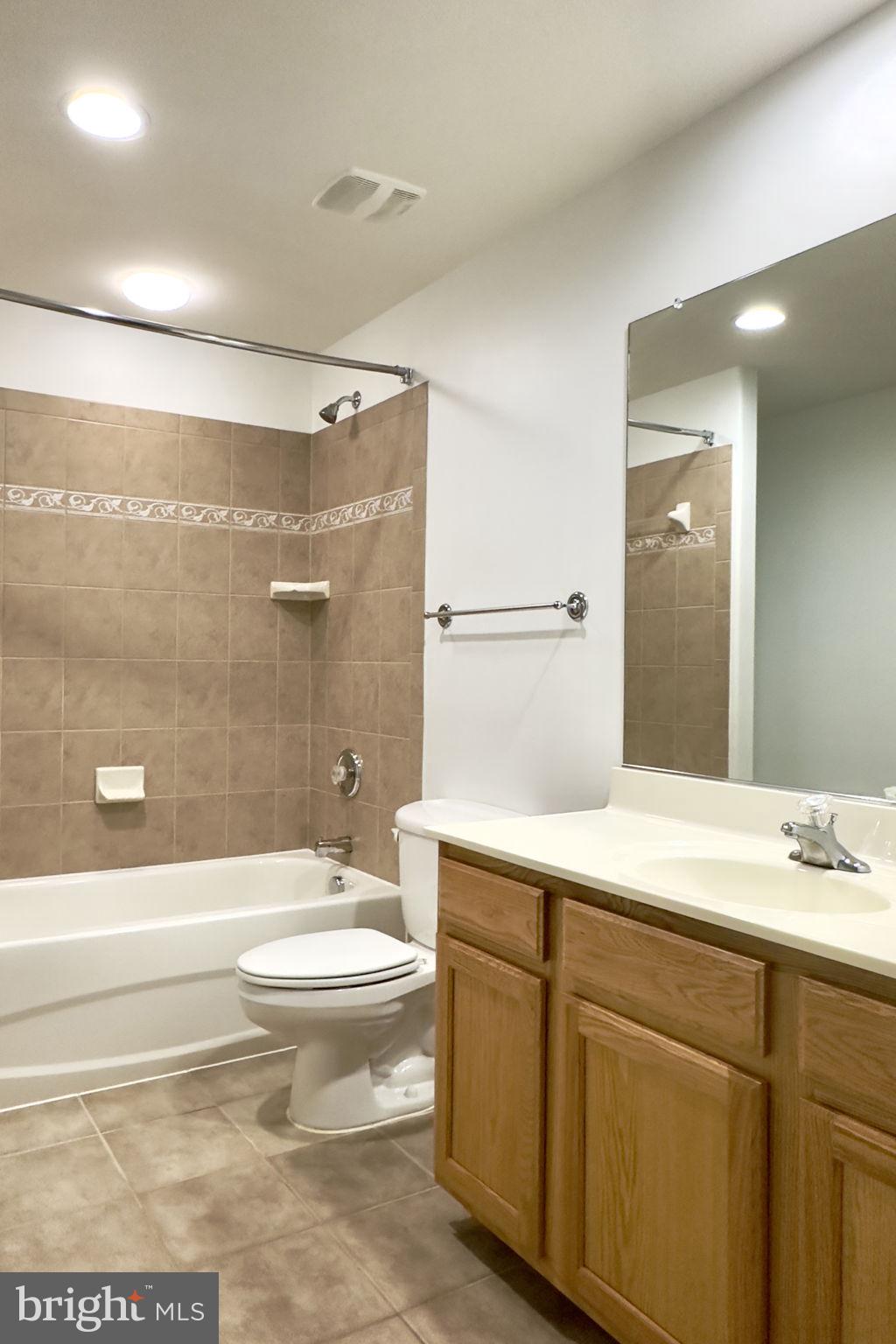 70 Sentinel Ridge Lane Stafford, VA 22554 - Photo 41 of 53 a bathroom with a sink a toilet and shower