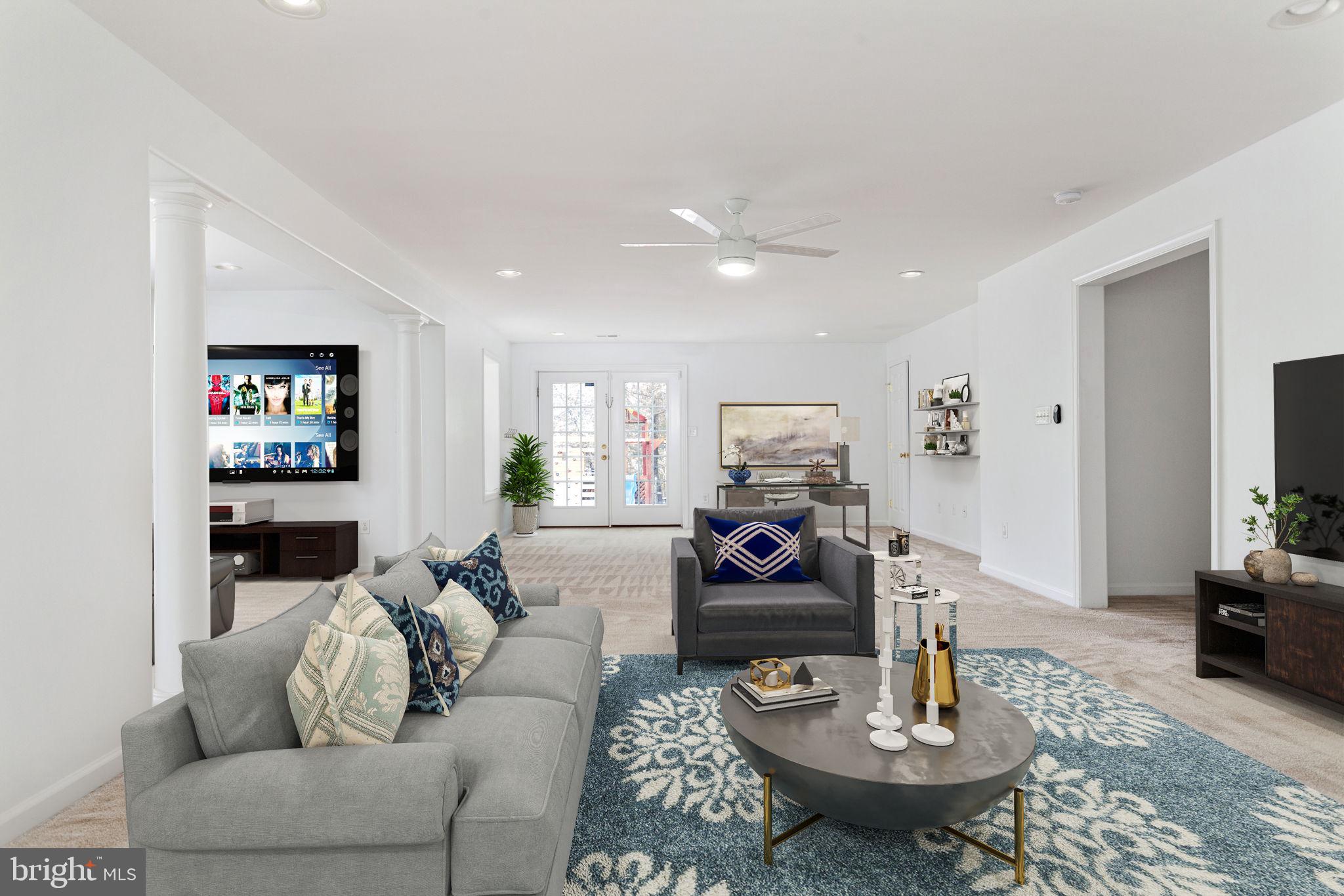 70 Sentinel Ridge Lane Stafford, VA 22554 - Photo 43 of 53 a living room with furniture and a wooden floor
