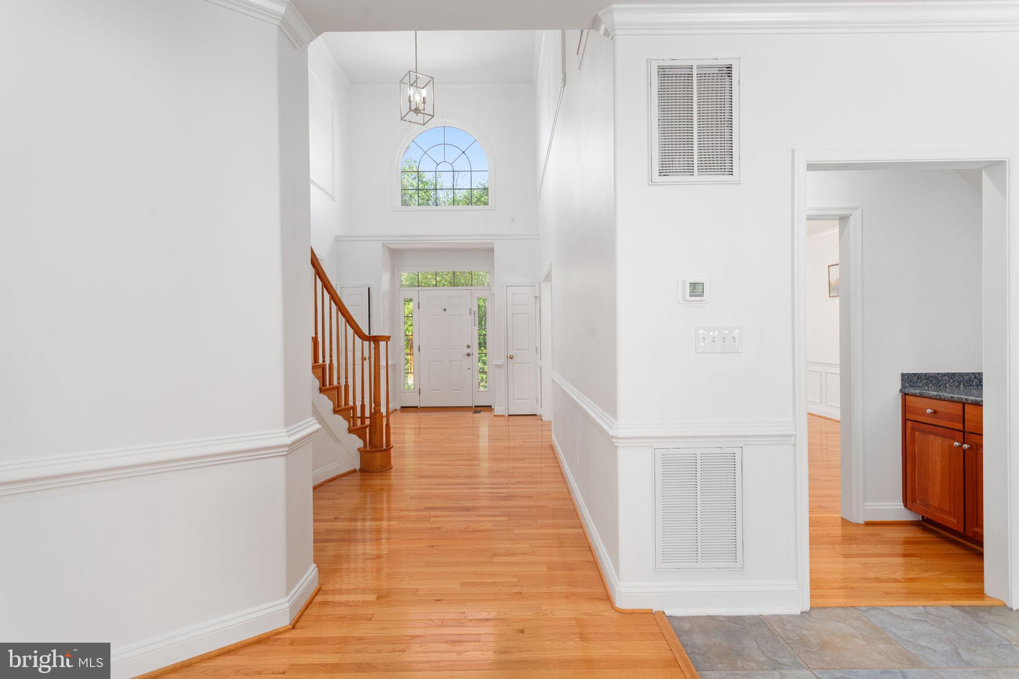 70 Sentinel Ridge Lane Stafford, VA 22554 - Photo 5 of 53 a view of entryway and hall with wooden floor