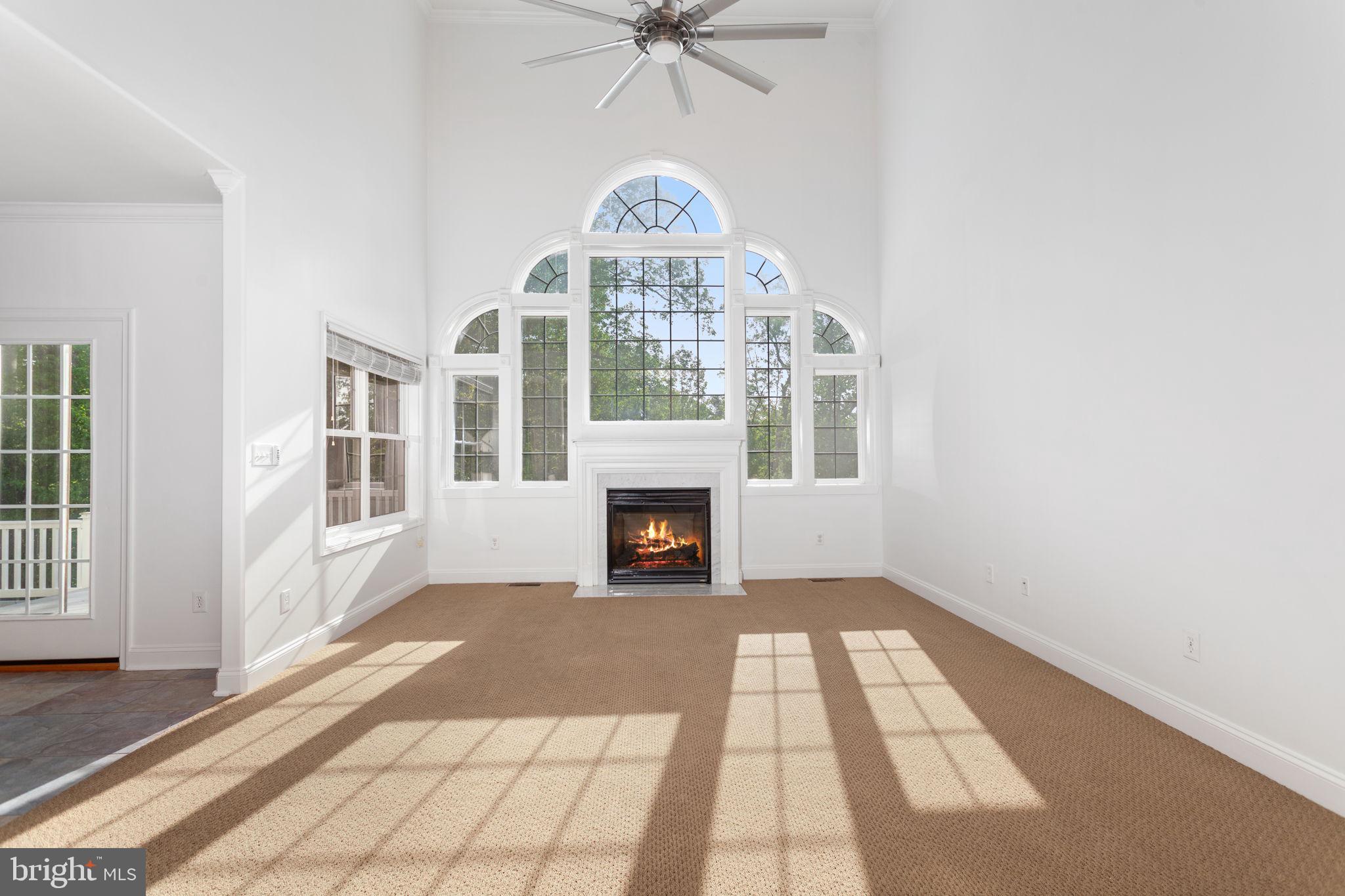 70 Sentinel Ridge Lane Stafford, VA 22554 - Photo 6 of 53 an empty room with windows and fireplace