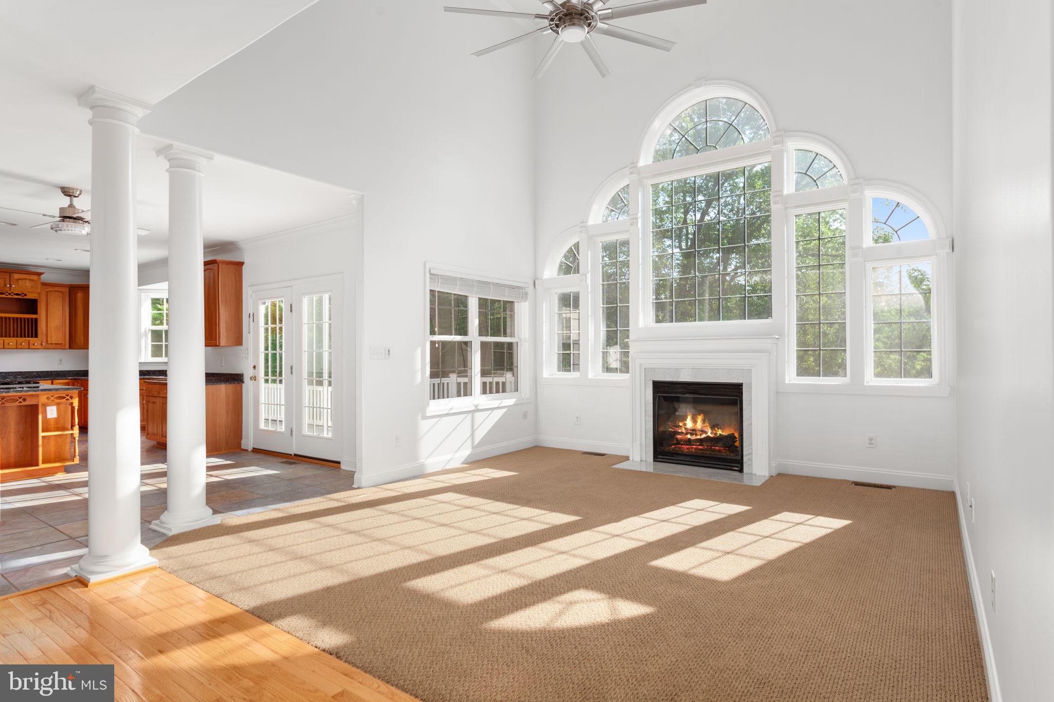 70 Sentinel Ridge Lane Stafford, VA 22554 - Photo 9 of 53 a view of an empty room with a fireplace and a window